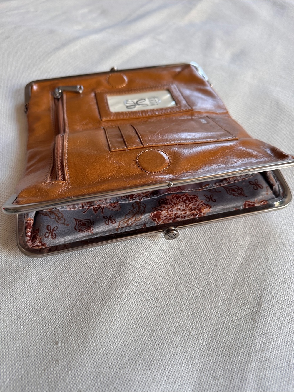 HOBO Lauren Clutch Wallet Polished Leather in Truffle